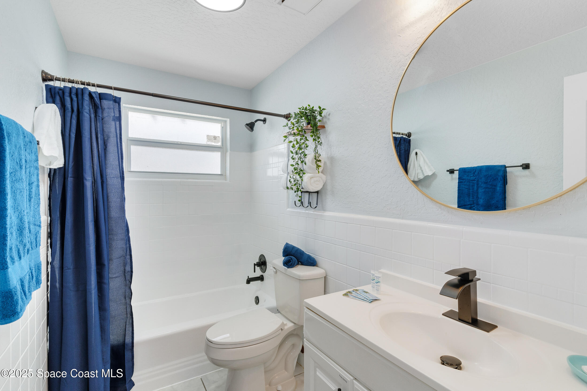 1029 Park Drive, Unit 32 Indian Harbour Beach, FL 32937 - Photo 17 of 35 a bathroom with a sink toilet and shower