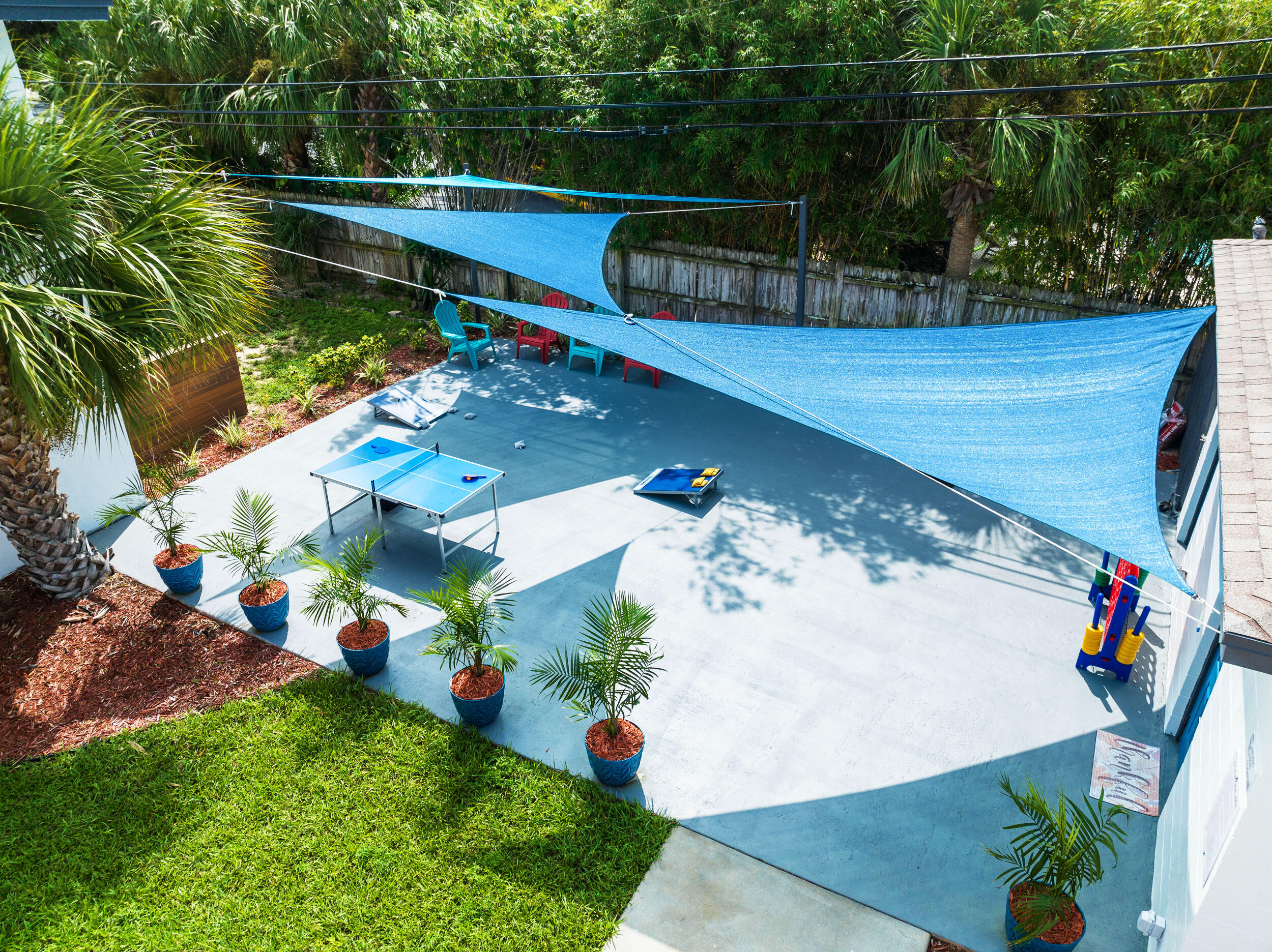 1029 Park Drive, Unit 32 Indian Harbour Beach, FL 32937 - Photo 28 of 35 a view of yard from deck with patio