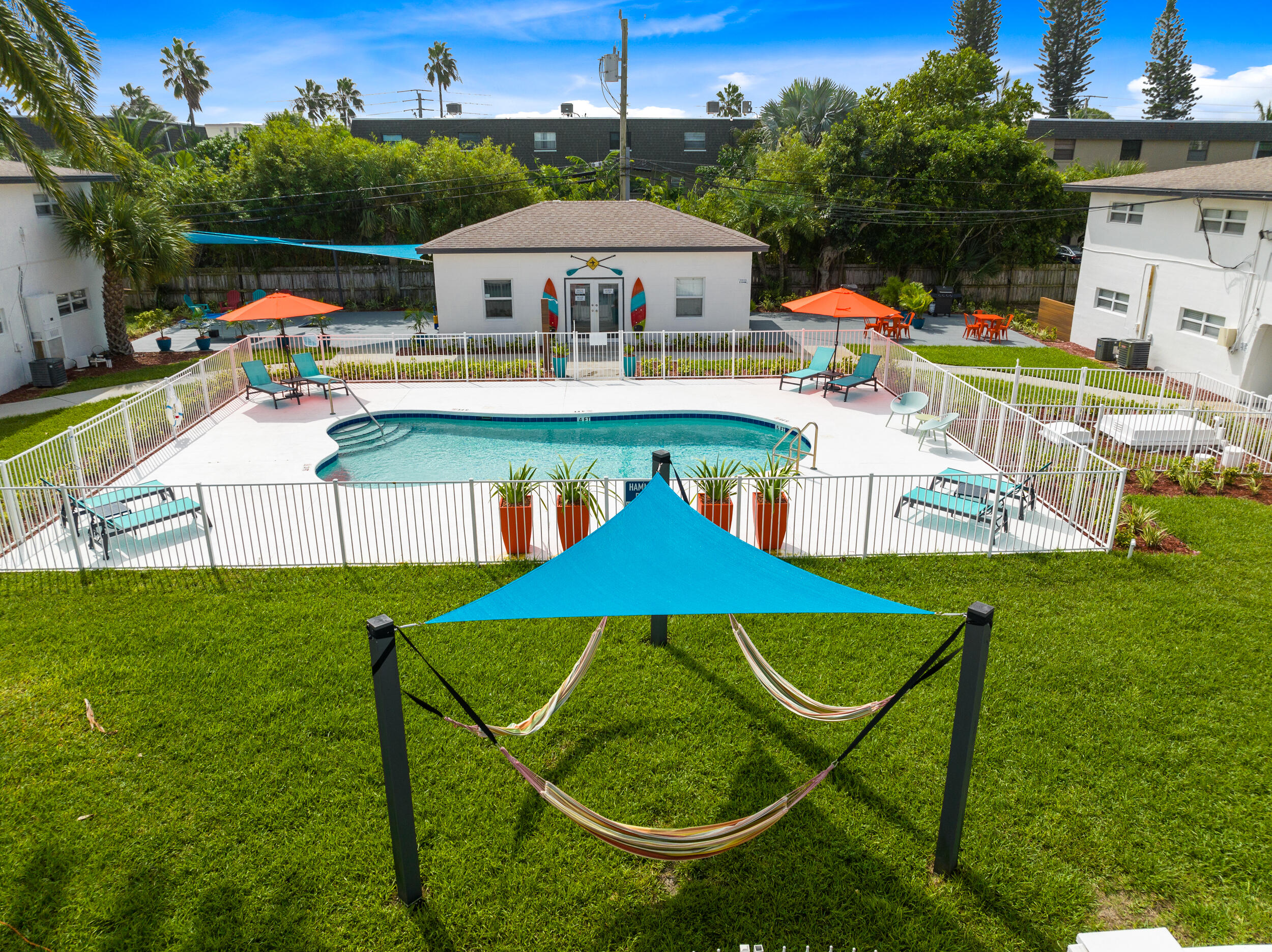 1029 Park Drive, Unit 32 Indian Harbour Beach, FL 32937 - Photo 29 of 35 an aerial view of a house with swimming pool garden and patio