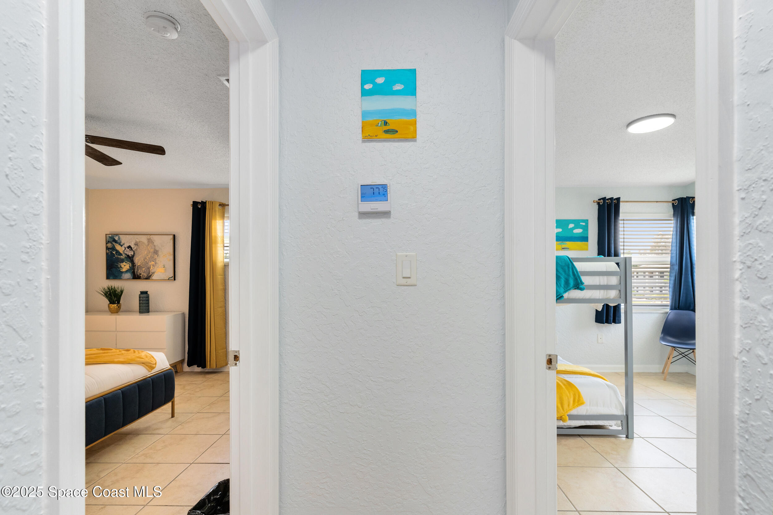 1029 Park Drive, Unit 32 Indian Harbour Beach, FL 32937 - Photo 10 of 35 a view of a bedroom with a bed and toys