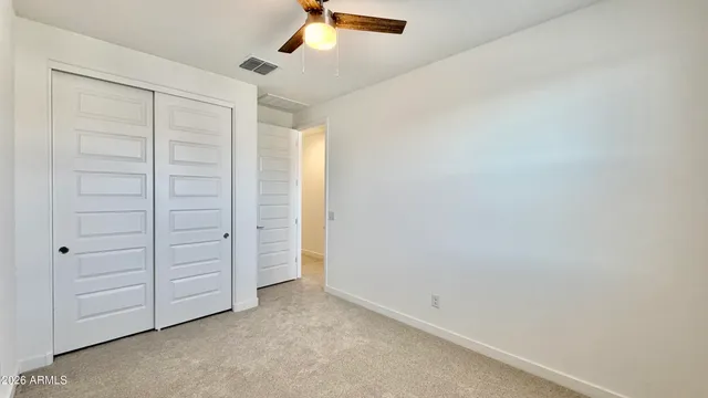 an empty room with closet