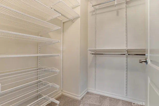 a view of a room with racks on the wall