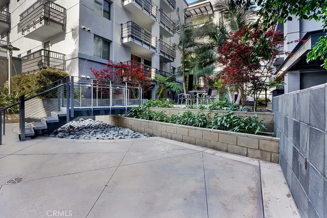 a view of path along with house and trees