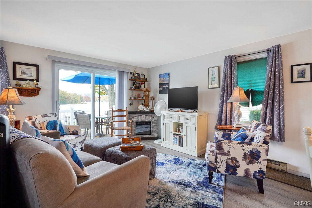 160 Evans Rd Extension Tully, NY 13159 - Photo 12 of 46 Electric fireplace heats up the entire cottage as