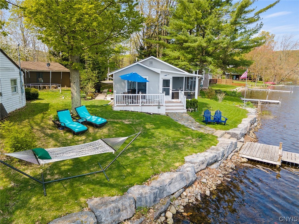 160 Evans Rd Extension Tully, NY 13159 - Photo 2 of 46 95' of level prime waterfront with seawall.