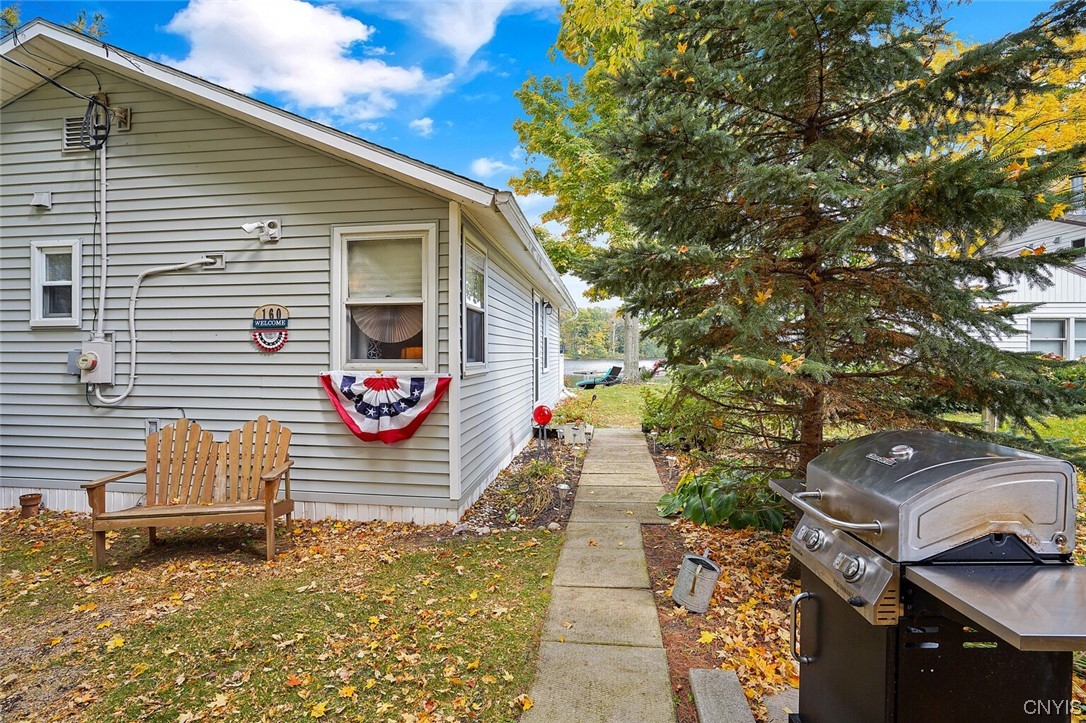 160 Evans Rd Extension Tully, NY 13159 - Photo 29 of 46 Enjoy the shade in the front of the cottage