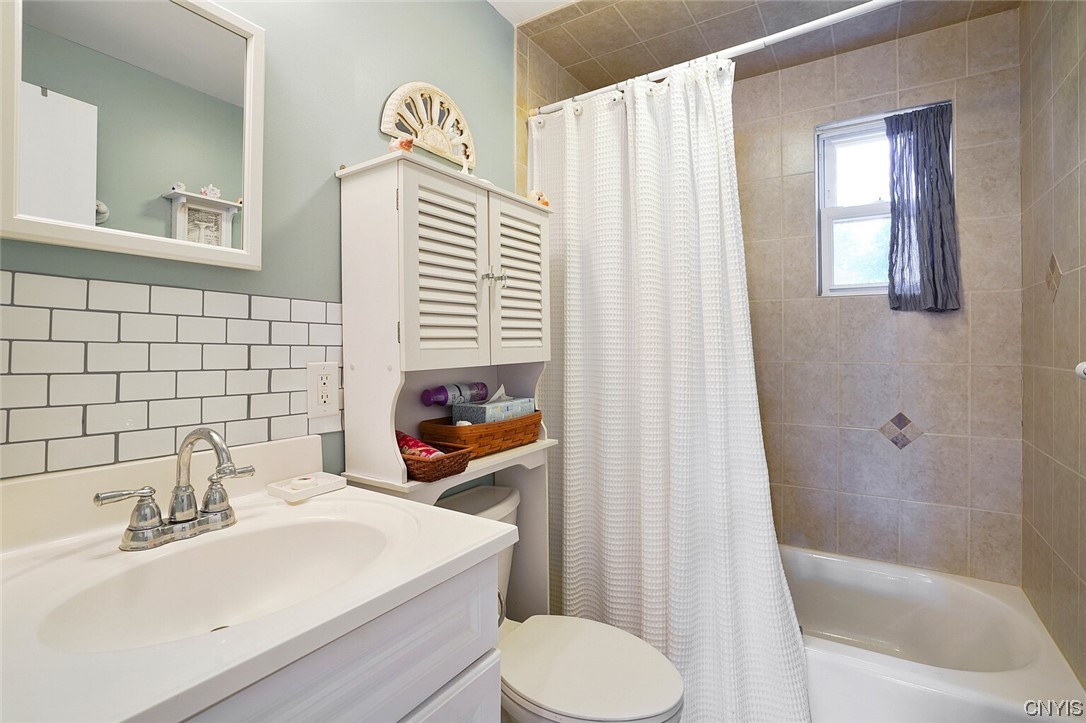 160 Evans Rd Extension Tully, NY 13159 - Photo 35 of 46 The bathroom has ceramic floors and fully tile tub