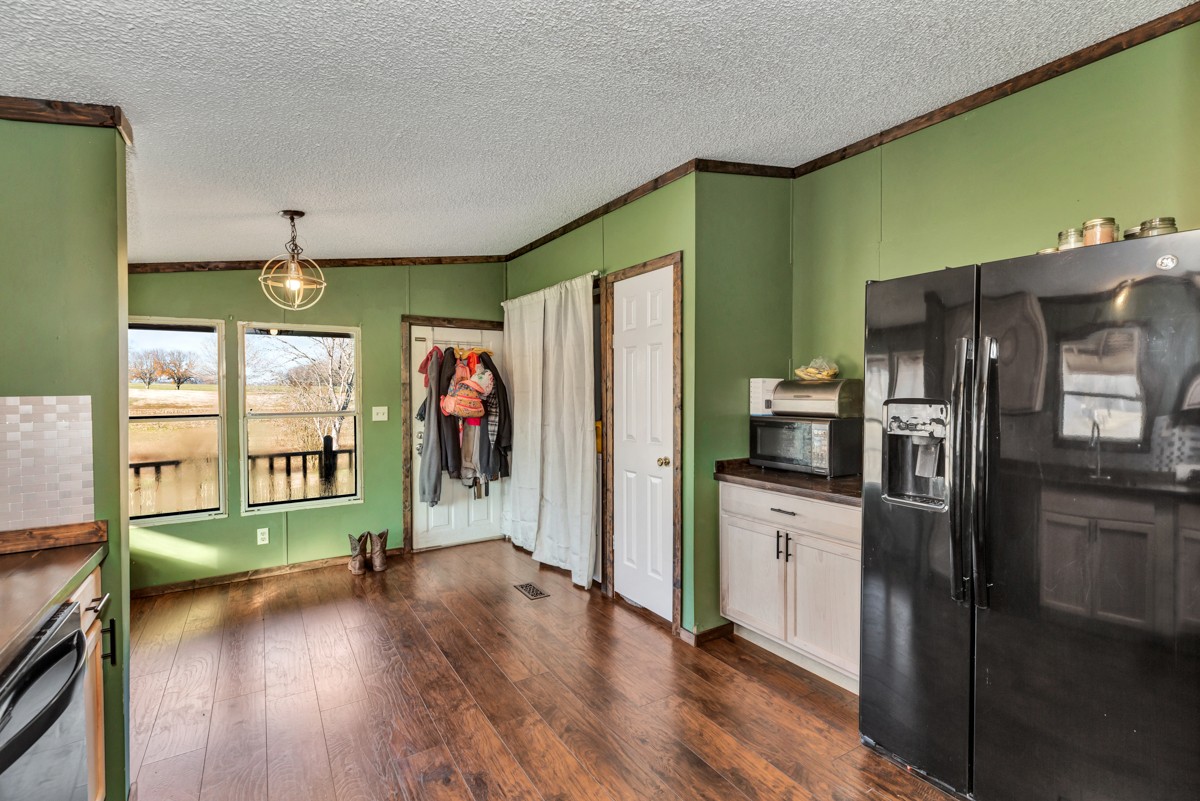 1919 Pleasant Hill Road Prospect, TN 38477 - Photo 11 of 24 a kitchen with stainless steel appliances a refrigerator and a stove