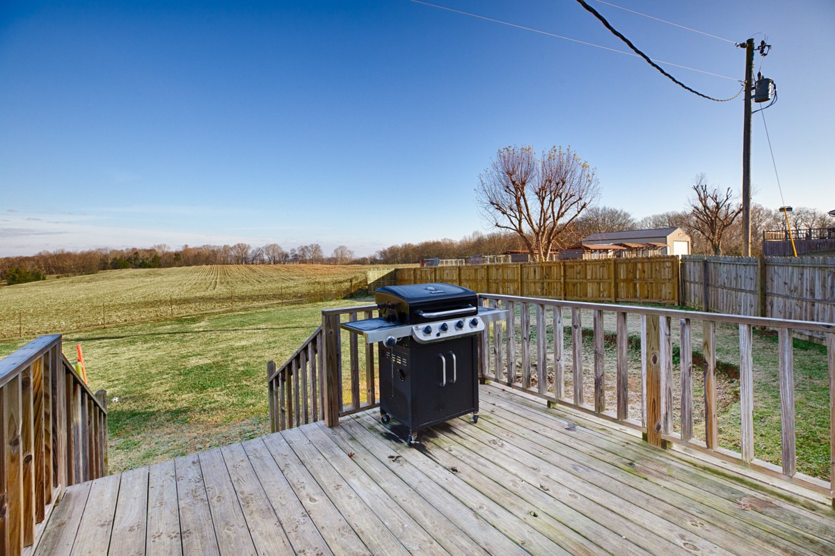 1919 Pleasant Hill Road Prospect, TN 38477 - Photo 21 of 24 a view of a balcony with wooden floor and outdoor space