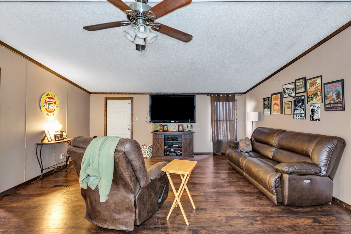 1919 Pleasant Hill Road Prospect, TN 38477 - Photo 6 of 24 a living room with furniture and a flat screen tv