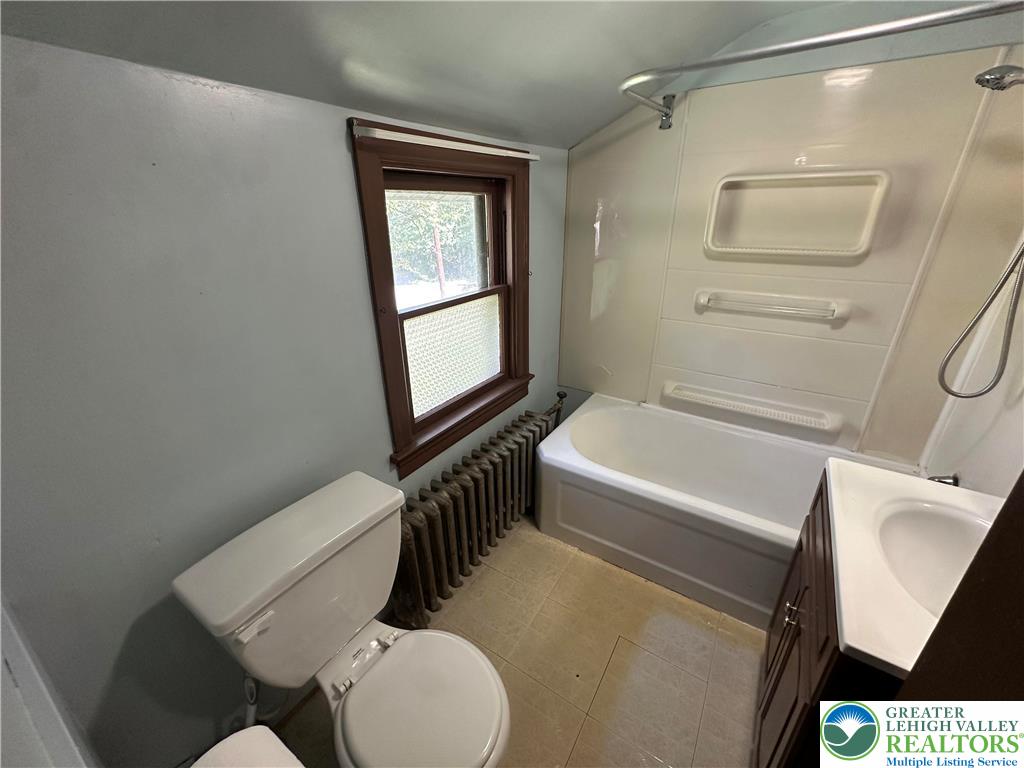 4024 South 2nd Street Emmaus, PA 18049 - Photo 11 of 19 a bathroom with a toilet and a bathtub