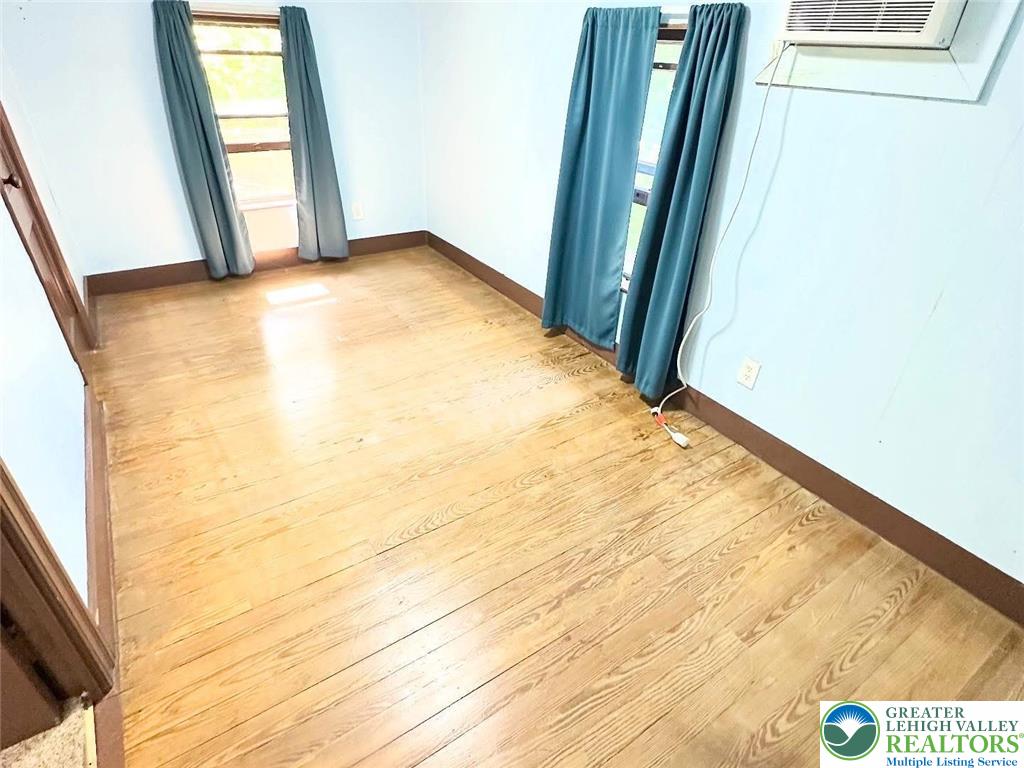 4024 South 2nd Street Emmaus, PA 18049 - Photo 16 of 19 a view of an empty room and wooden floor