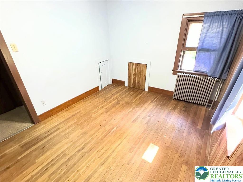4024 South 2nd Street Emmaus, PA 18049 - Photo 19 of 19 a view of empty room with wooden floor