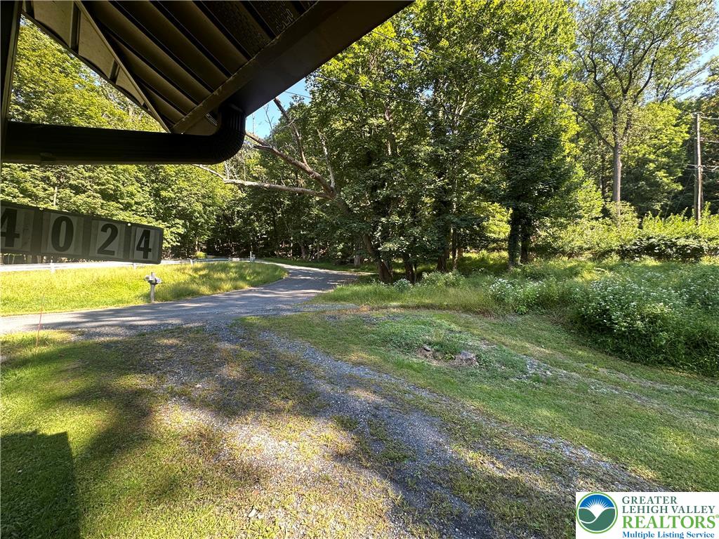 4024 South 2nd Street Emmaus, PA 18049 - Photo 4 of 19 a view of a big yard with large trees