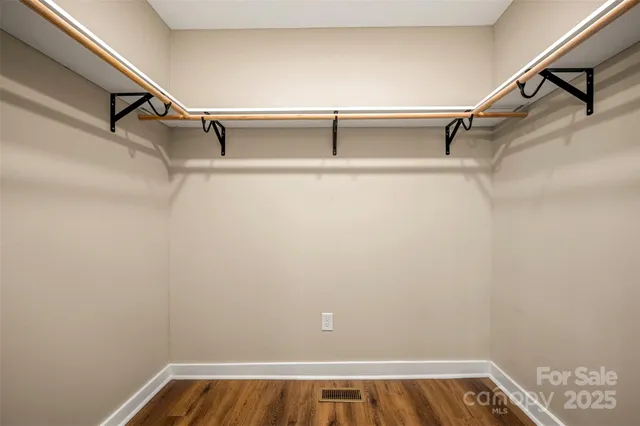 a view of a room with racks on the wall