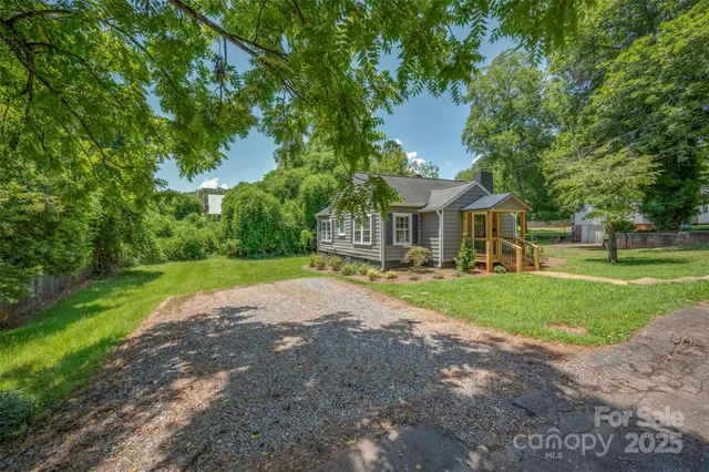 a front view of a house with yard