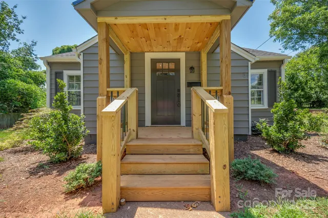 a view of a house with entryway and stairs