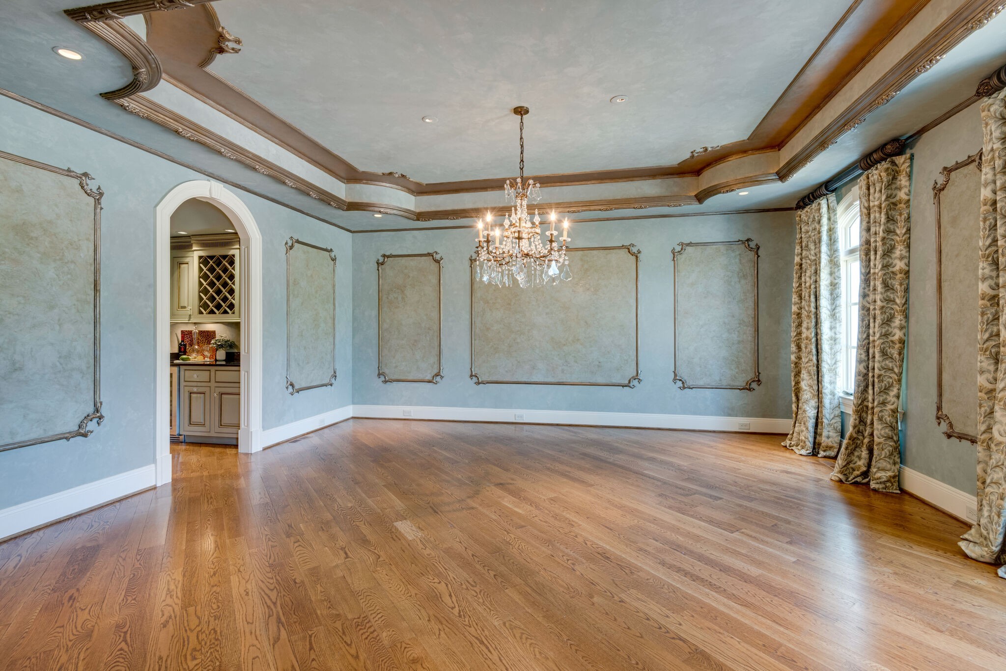 120 Woodward Hills Place Brentwood, TN 37027 - Photo 12 of 69 a view of a room with wooden floor chandelier and windows