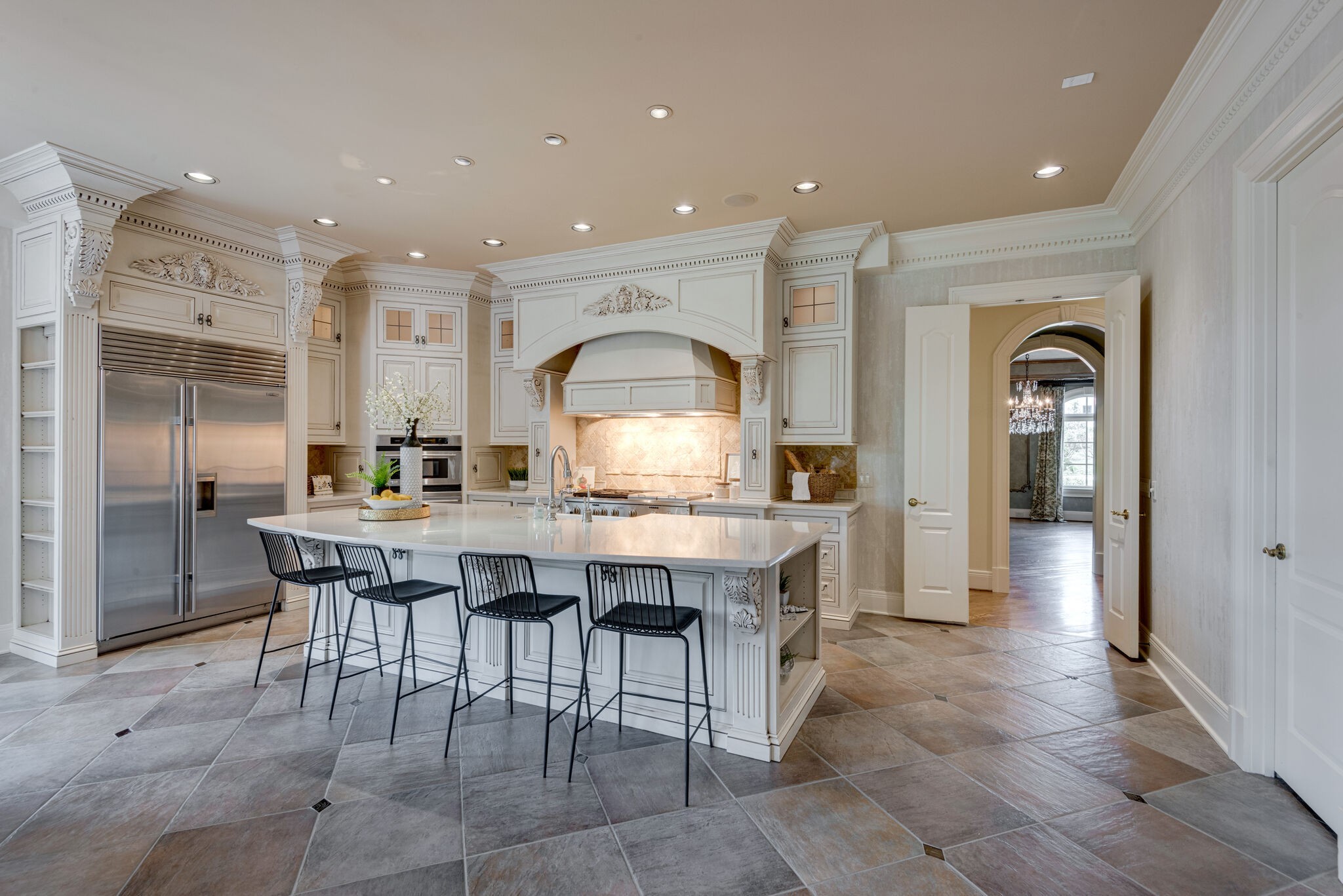 120 Woodward Hills Place Brentwood, TN 37027 - Photo 16 of 69 a dining hall with stainless steel appliances granite countertop a table and chairs