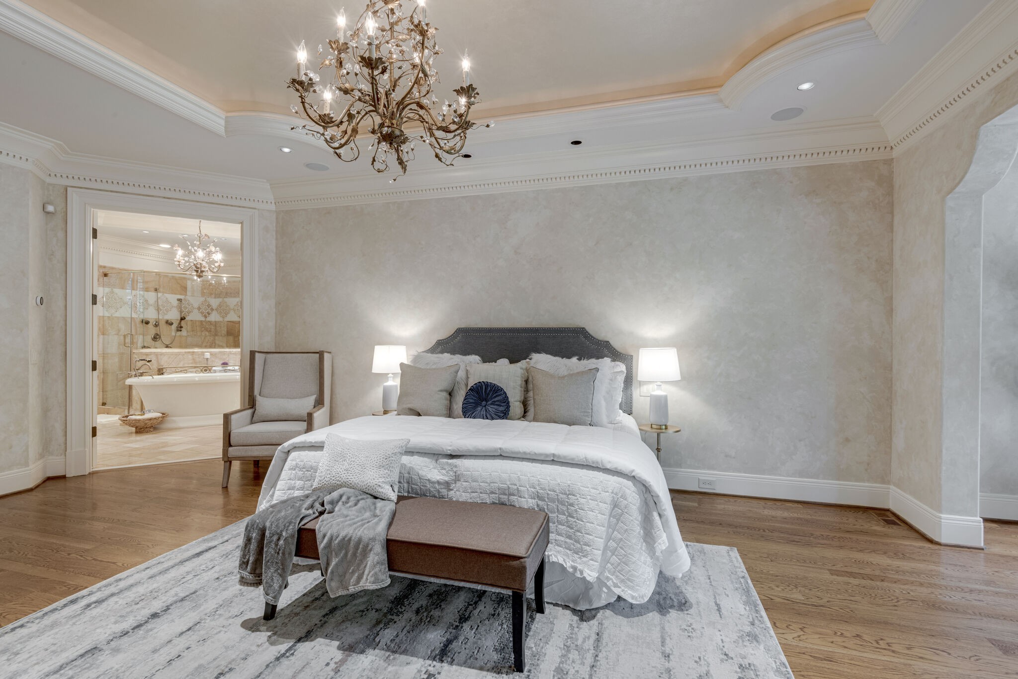 120 Woodward Hills Place Brentwood, TN 37027 - Photo 18 of 69 a bedroom with a bed and a chandelier