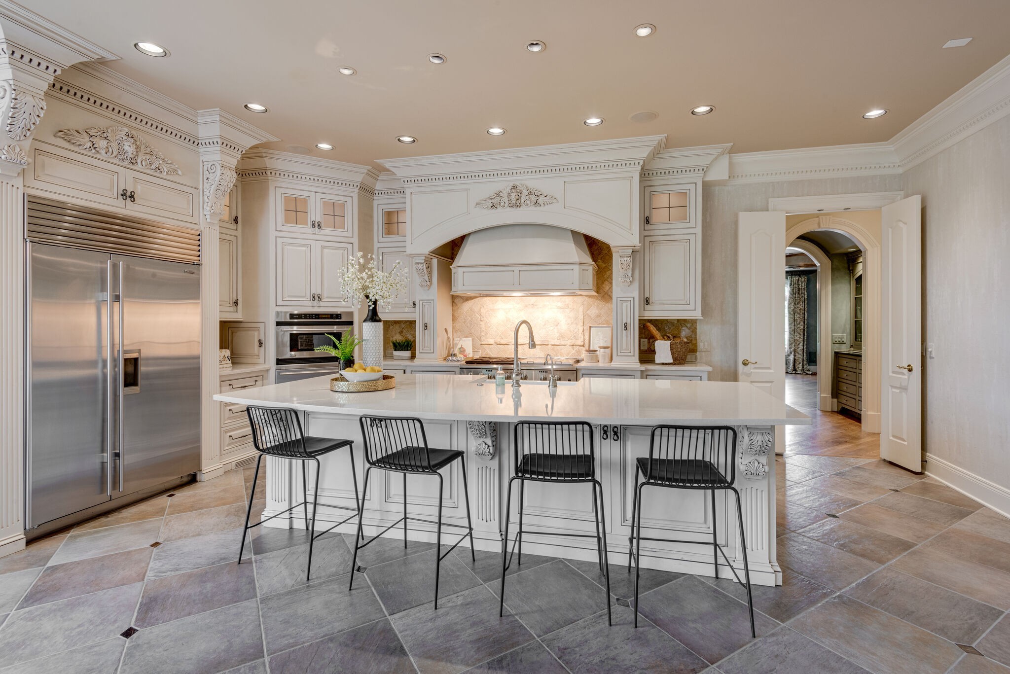120 Woodward Hills Place Brentwood, TN 37027 - Photo 27 of 69 a kitchen with a table and chairs in it