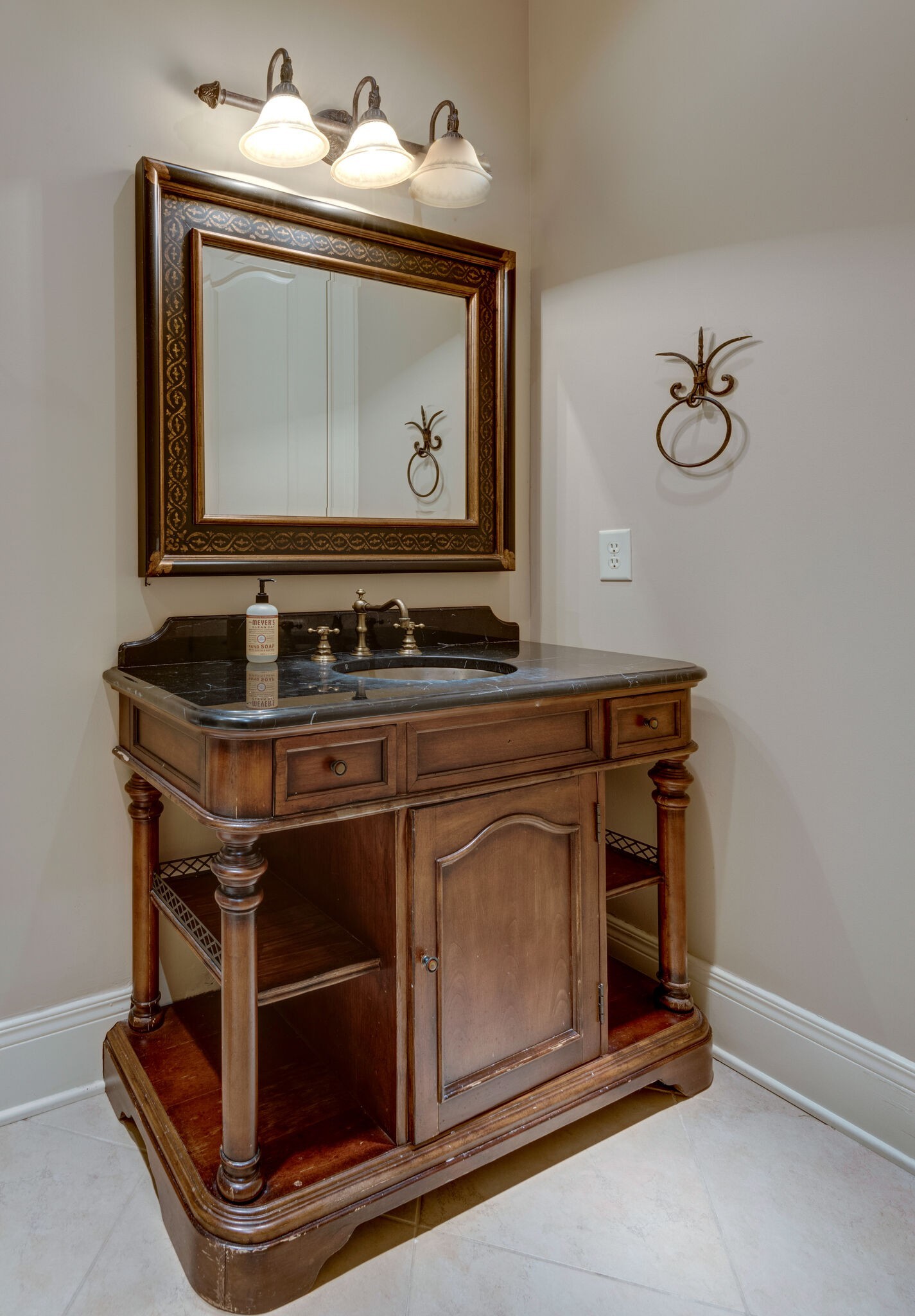 120 Woodward Hills Place Brentwood, TN 37027 - Photo 51 of 69 a bathroom with a sink and a mirror