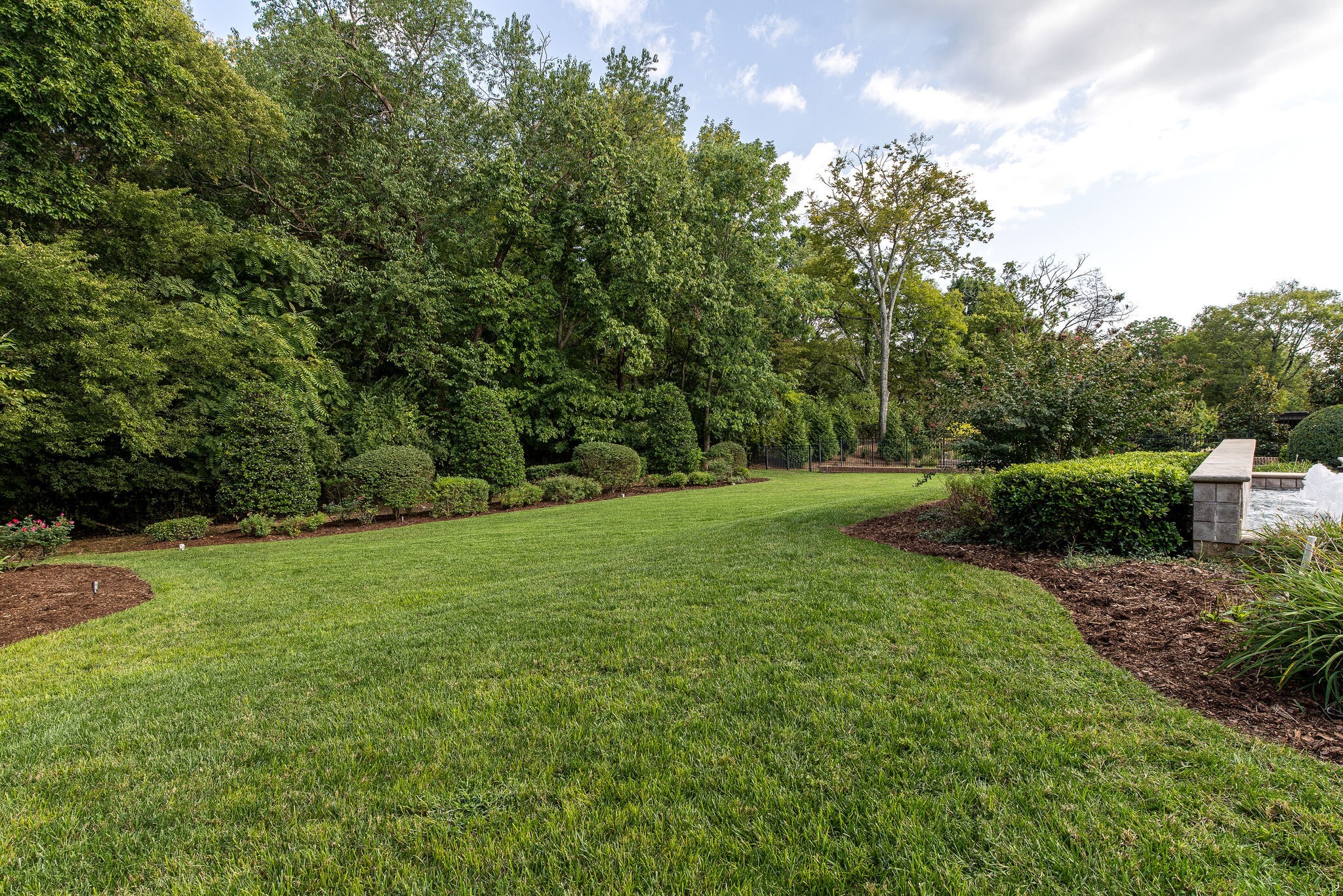 120 Woodward Hills Place Brentwood, TN 37027 - Photo 65 of 69 a view of a grassy field with trees