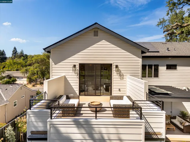 a bathroom with double vanity sinks and a mirror