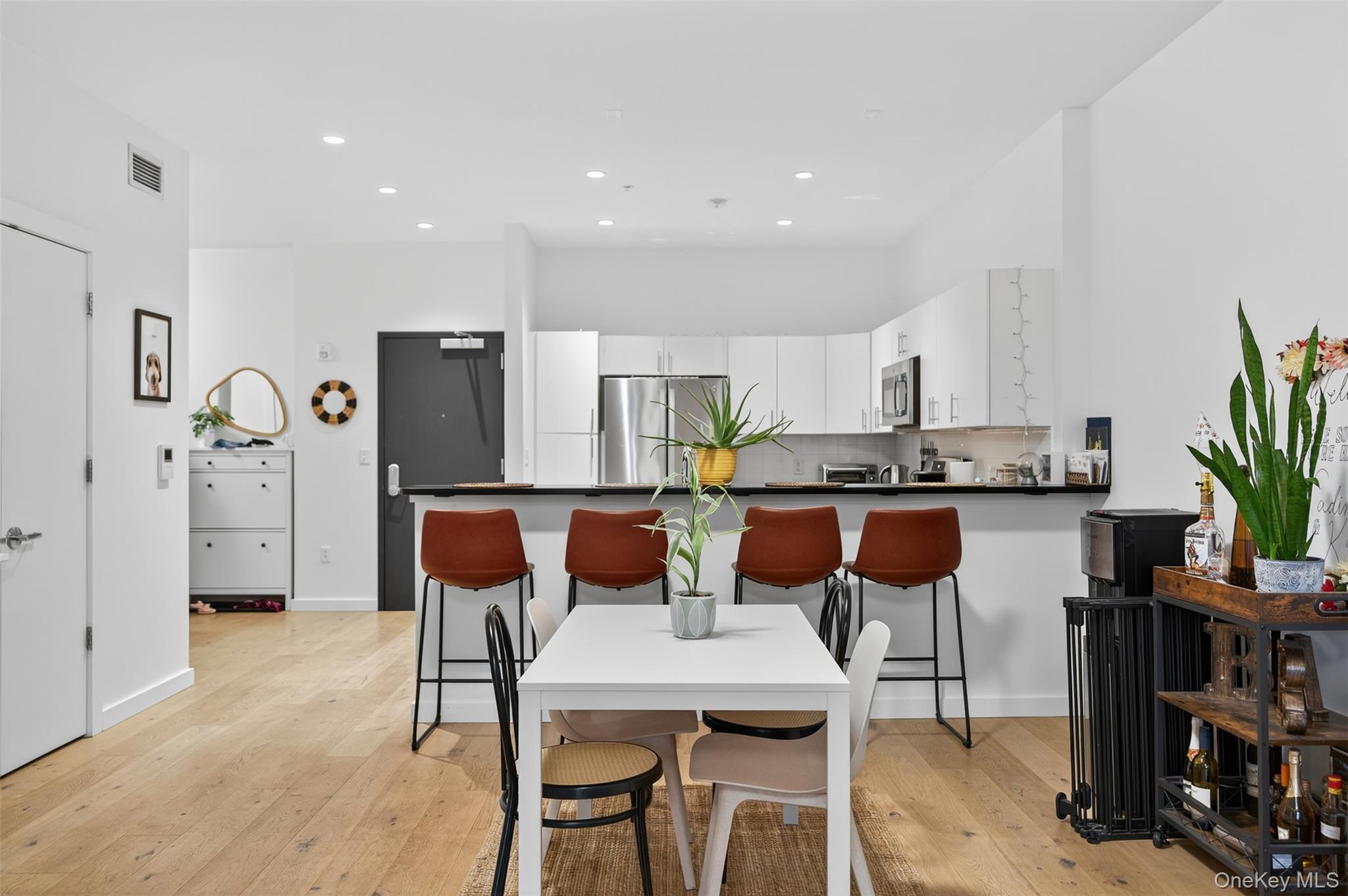 249 Main Street, Unit 305 Beacon, NY 12508 - Photo 12 of 36 Dining area featuring light wood-type flooring and recessed lighting