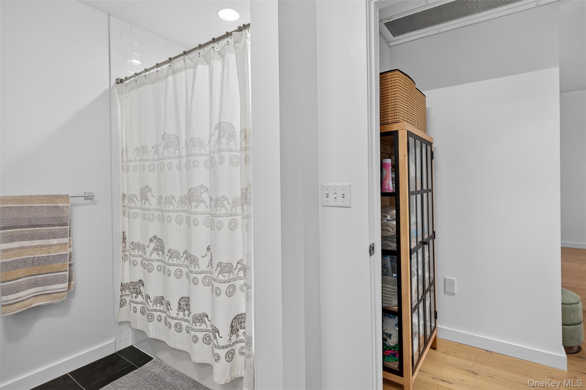 249 Main Street, Unit 305 Beacon, NY 12508 - Photo 17 of 36 Bathroom with baseboards and a shower with shower curtain