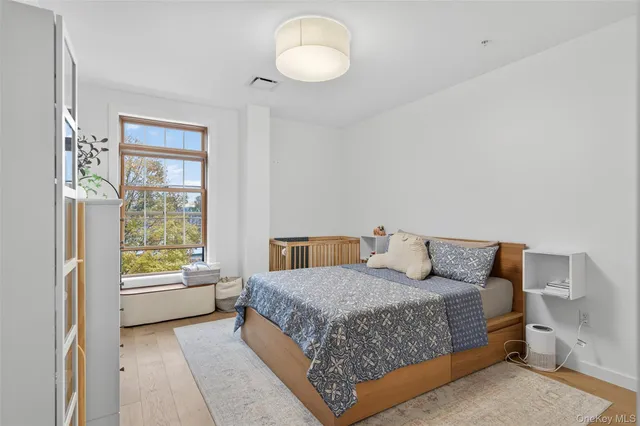 a view of a hallway with washer and dryer