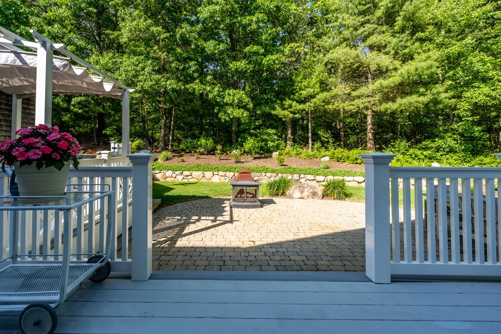 24 Miller Farm Road Mashpee, MA 02649 - Photo 13 of 28 a view of a porch with furniture