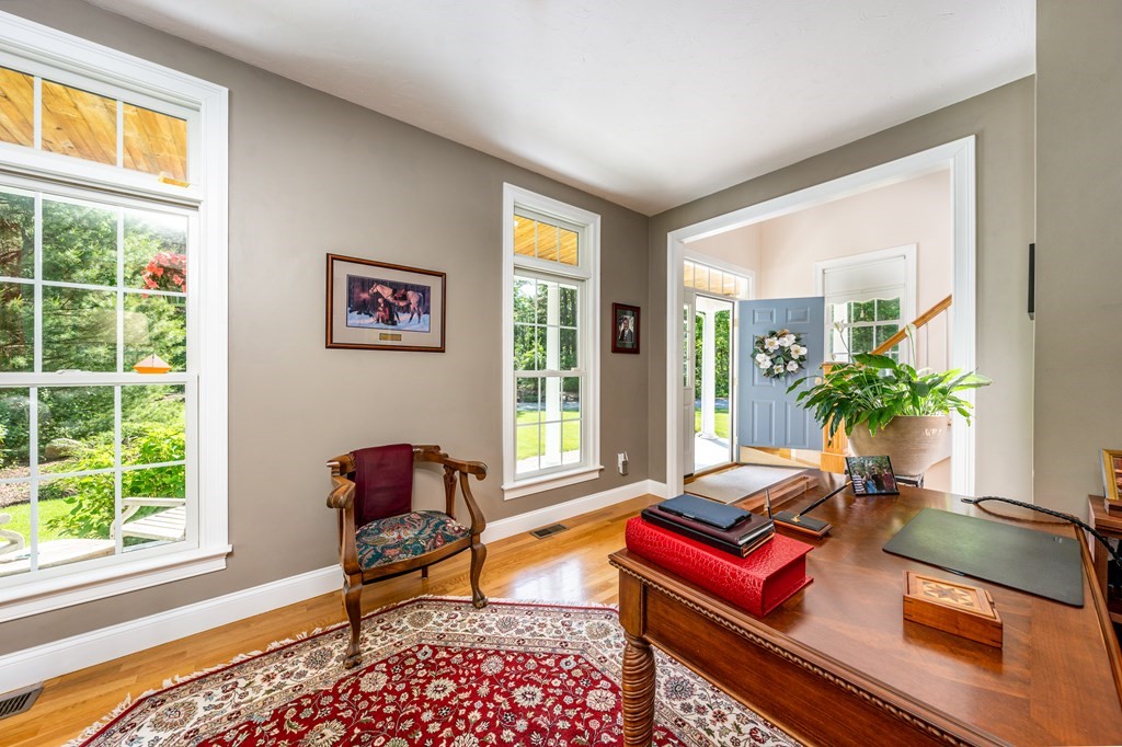 24 Miller Farm Road Mashpee, MA 02649 - Photo 4 of 28 a living room with furniture and a window