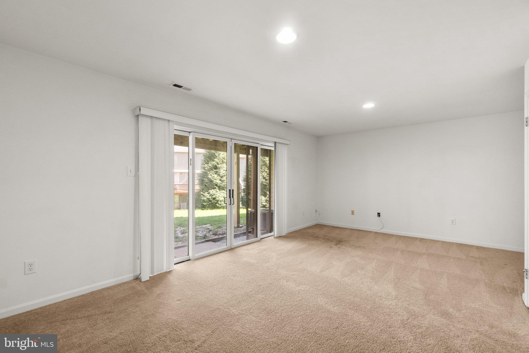 5269 Columbia Road, Unit 4 89 Columbia, MD 21044 - Photo 29 of 50 Family Room with Sliders to Backyard