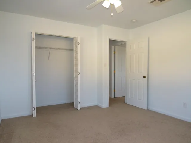 an empty room with a bathroom