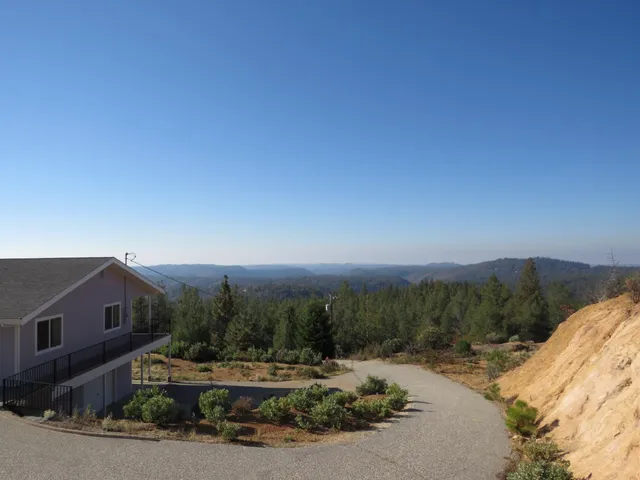 a bathroom with a toilet and a bathtub