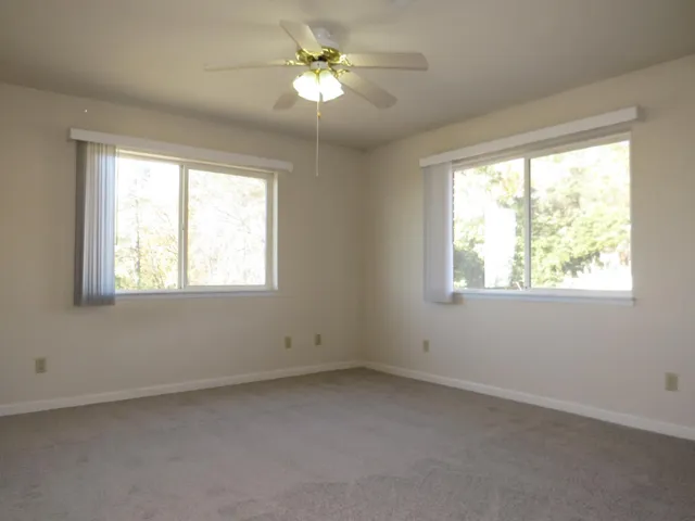 a picture of a bathroom with a shower