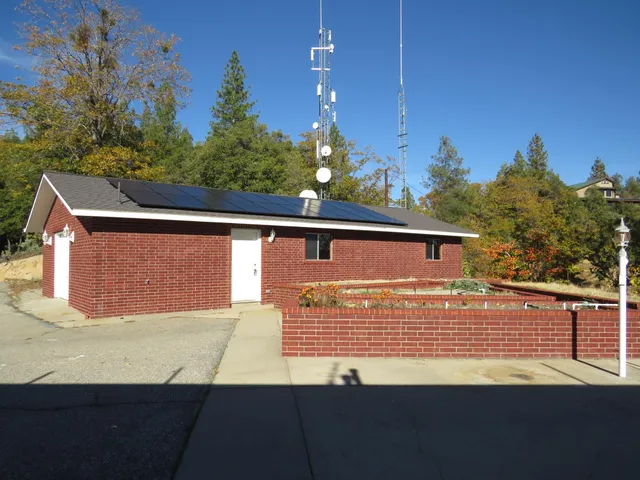 a house with trees in front of it