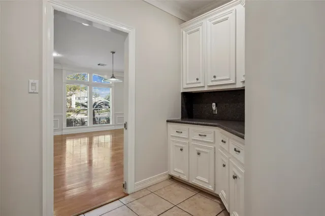 a view of cabinets and window