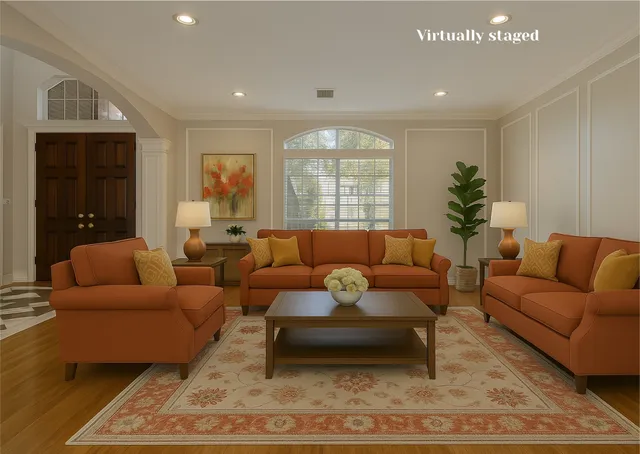 a living room with furniture and a rug