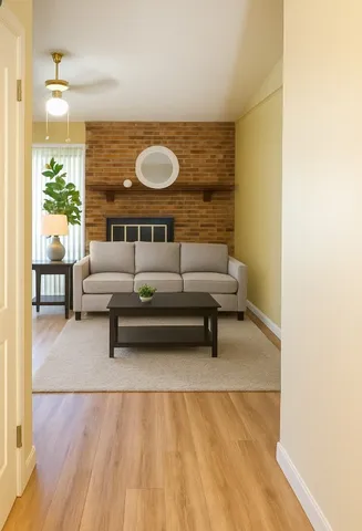 a living room with furniture and a rug