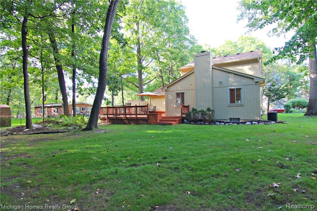 1410 Omega Road Walled Lake, MI 48390 - Photo 21 of 23 Omega Rd Back.jpg