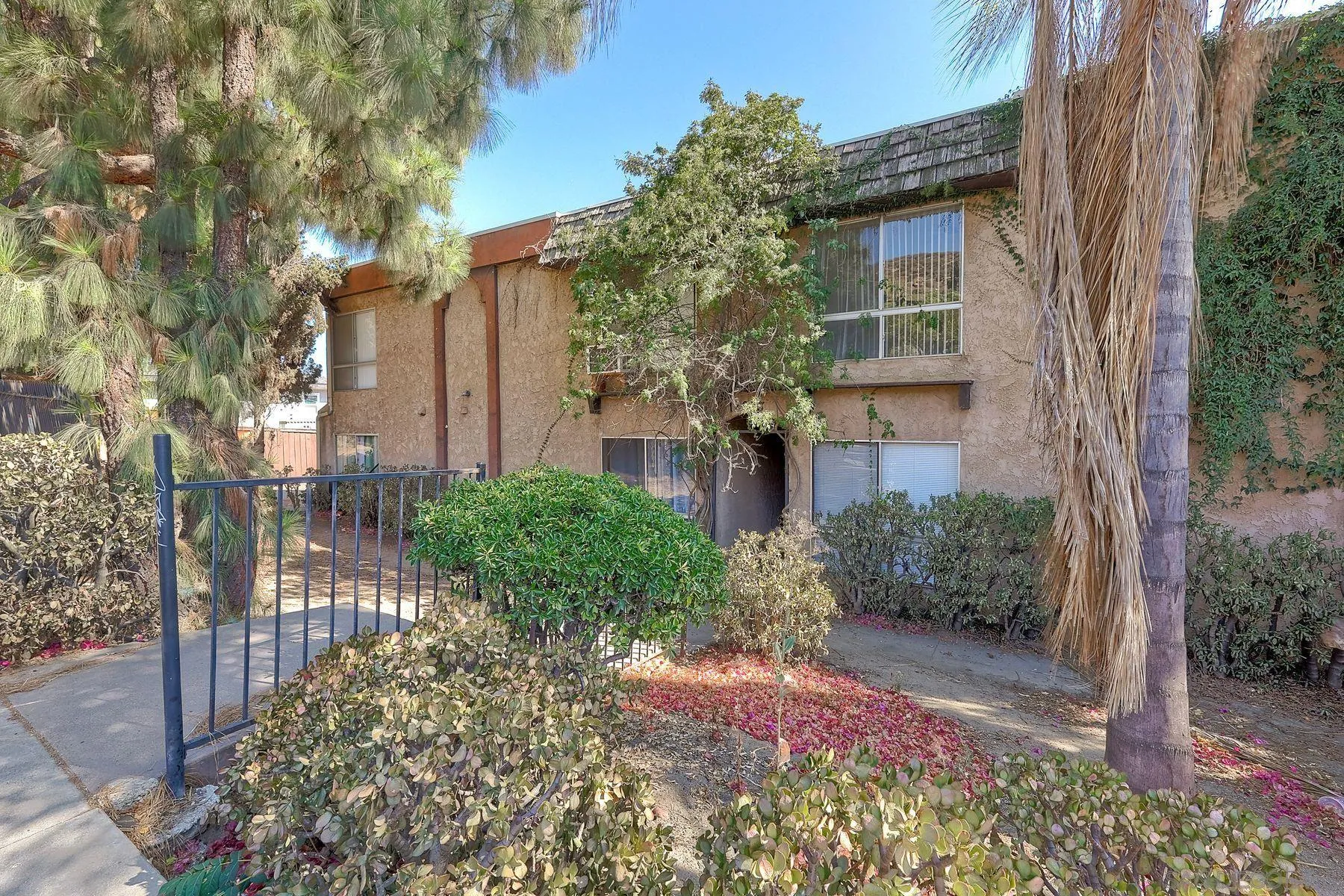 12923 Mapleview Street, Unit 6 Lakeside, CA 92040 - Photo 25 of 25 a front view of a house with garden