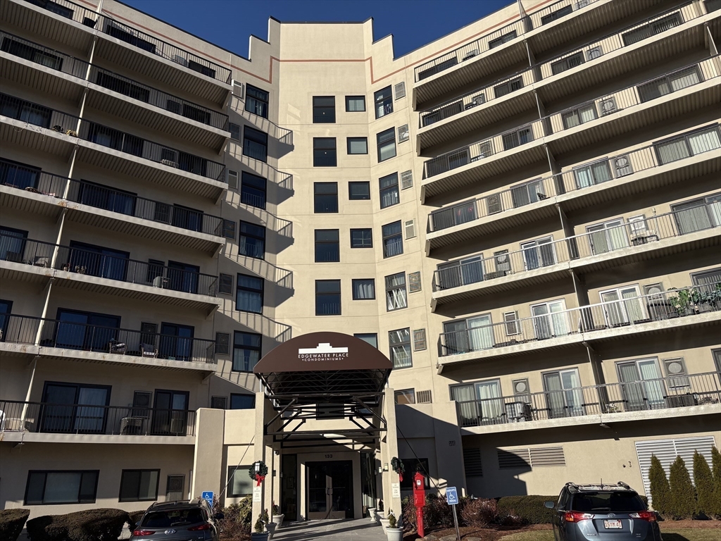 133 Commander Shea Boulevard, Unit 709 Quincy, MA 02171 - Photo 3 of 16 a view of building with lot of windows