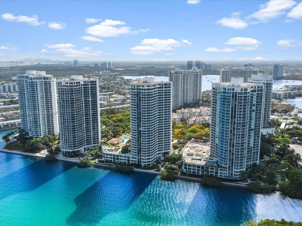 a view of a city with tall buildings
