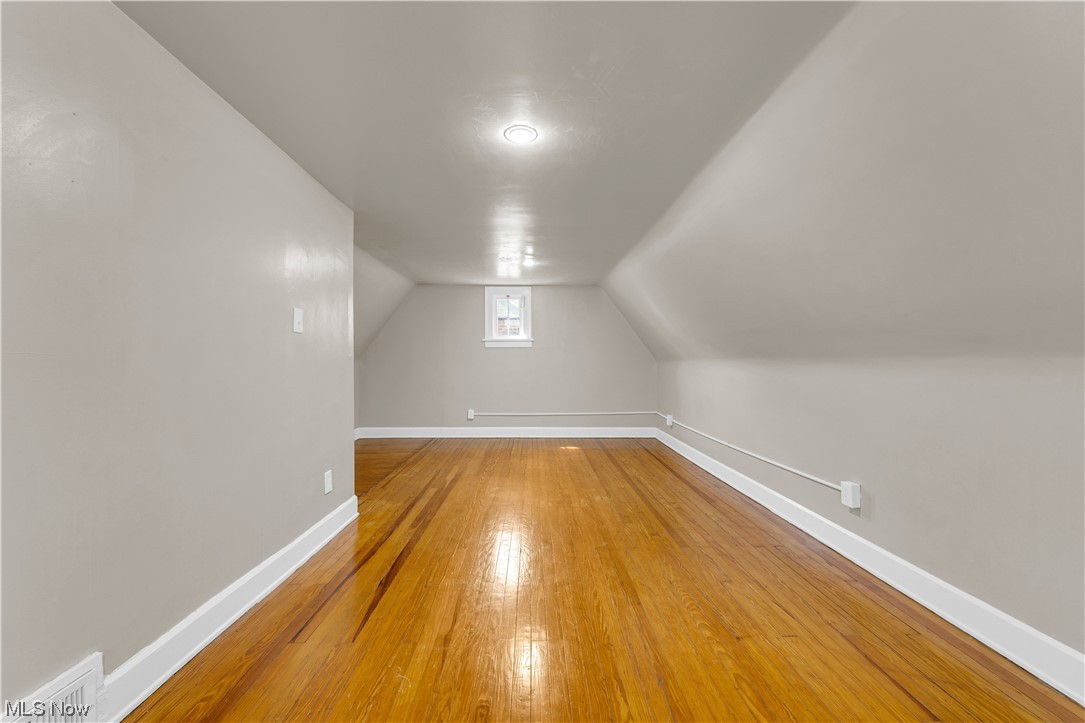 3609 Strandhill Road Shaker Heights, OH 44122 - Photo 18 of 47 Bonus room featuring lofted ceiling and light wood-type flooring