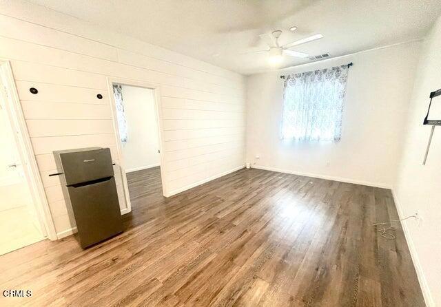3431 North Oxnard Boulevard, Unit B Oxnard, CA 93036 - Photo 3 of 15 a view of a storage & utility room with wooden floor