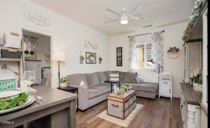 3431 North Oxnard Boulevard, Unit B Oxnard, CA 93036 - Photo 4 of 15 a living room with furniture and a large window