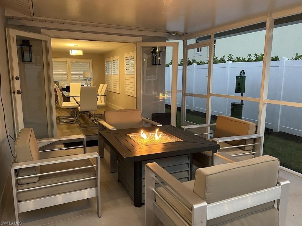 2270 Harbor Road Naples, FL 34104 - Photo 15 of 21 a room with table and chairs