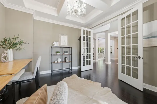 a bedroom with a bed furniture and a window